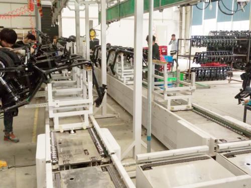 Electric vehicle frame assembly line