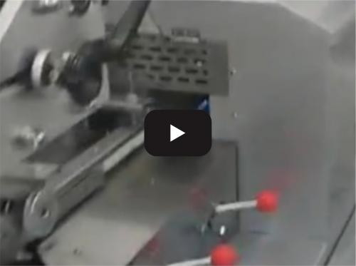 Automatic candy packaging machine